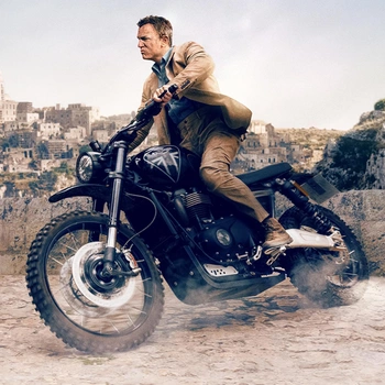 Daniel Craig as James Bond in No Time to Die movie on triumph 900 motorcycle