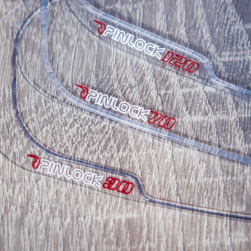 Image of three pinlock anti-fog visor inserts with grades of anti-fog clarity
