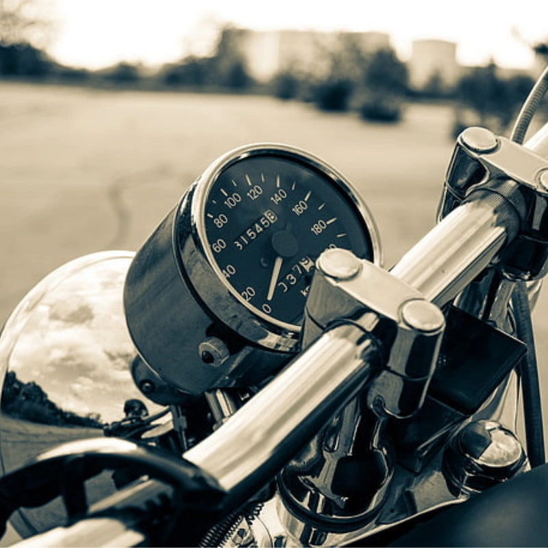 Motorcycle handlebar with odometer