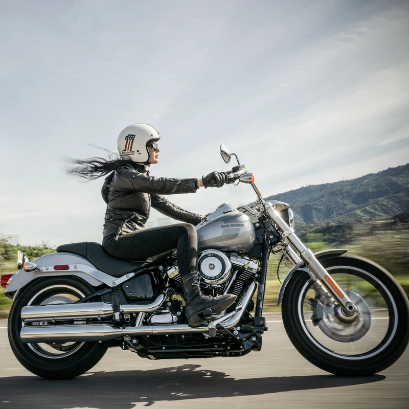 Image of rider riding on a Harley-Davidson cruiser bike