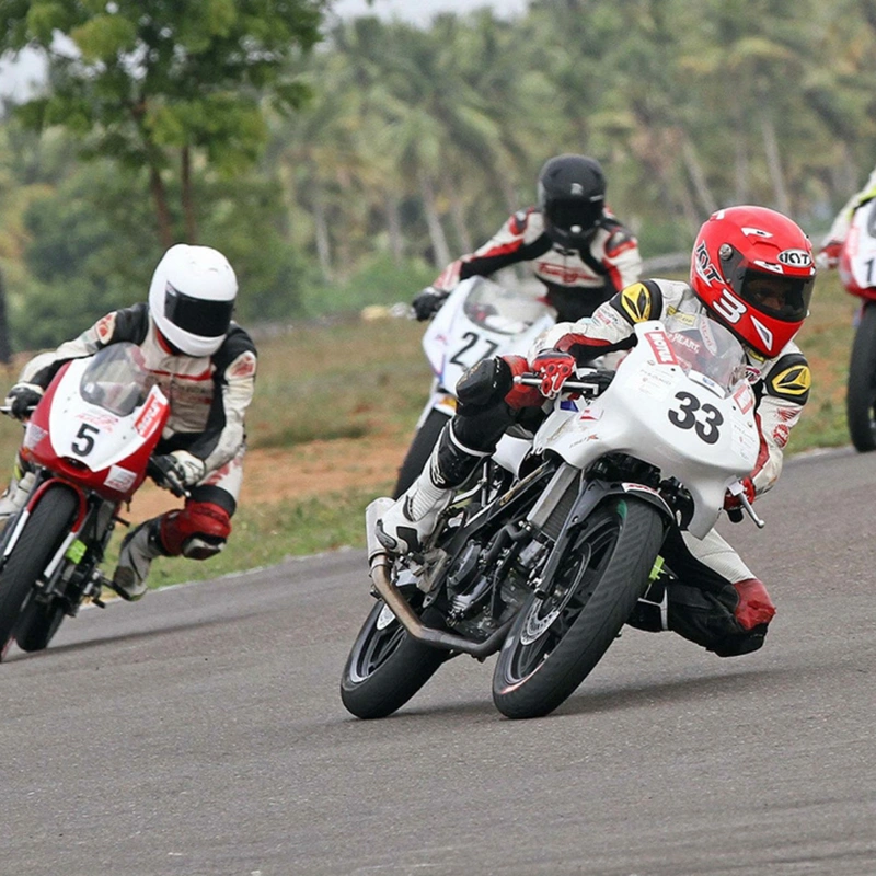 Image of motorcycle riders practicing on racing tracks