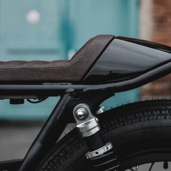 Image of brown seat cushion fitted on motorcycle seat